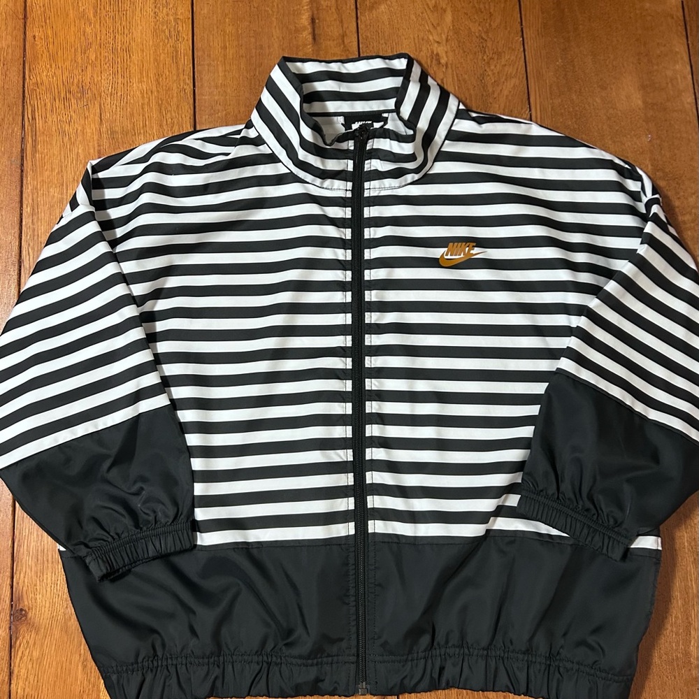 Nike Black and White Striped Jacket with Gold Logo